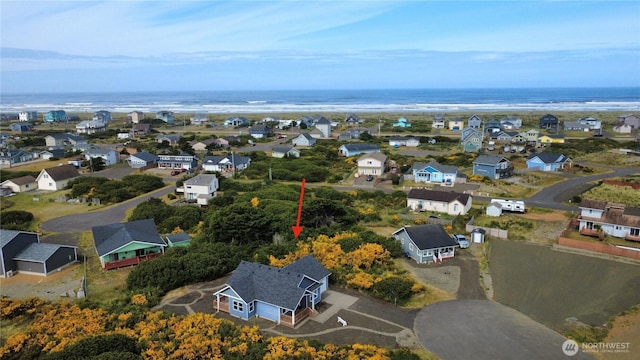 1111 Riverside Ct, Ocean Shores, WA 98569 - aerial view of residential area with a nearby body of water