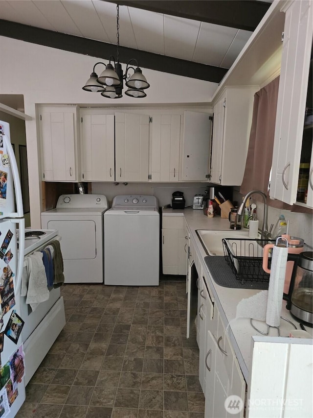1208 NE 110th St, Seattle, WA 98125 - washroom featuring a chandelier, independent washer and dryer, and stone finish floors