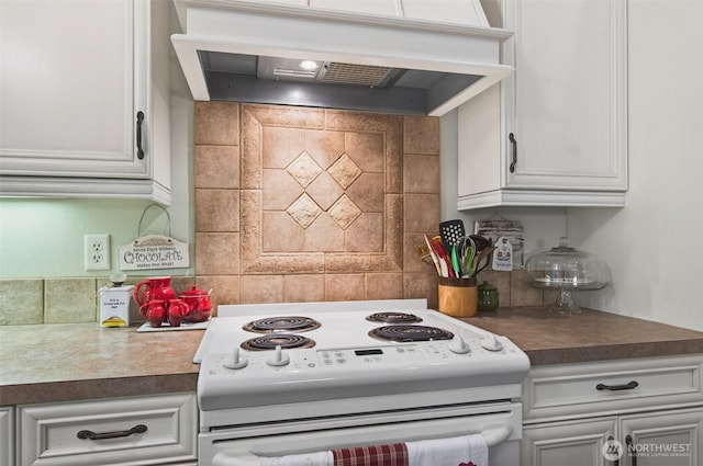 721 Abernathy Creek Rd, Longview, WA 98632 - kitchen featuring white electric range, custom range hood, tasteful backsplash, and white cabinetry
