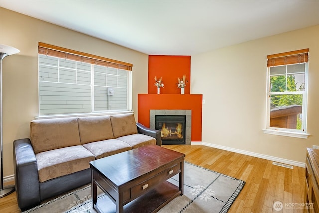 2740 Undine Pl, Bellingham, WA 98226 - living area with light wood-type flooring and a tiled fireplace