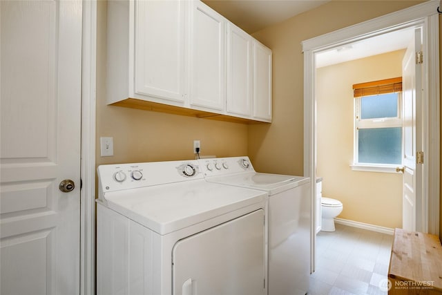2740 Undine Pl, Bellingham, WA 98226 - washroom with washer and clothes dryer, cabinet space, and light floors