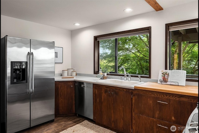 26710 NE Stephens St, Duvall, WA 98019 - kitchen with appliances with stainless steel finishes, dark wood-style flooring, dark brown cabinets, and recessed lighting