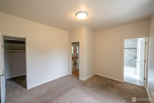 1117 W Stockwell St, Aberdeen, WA 98520 - unfurnished bedroom with carpet floors, a spacious closet, and a closet