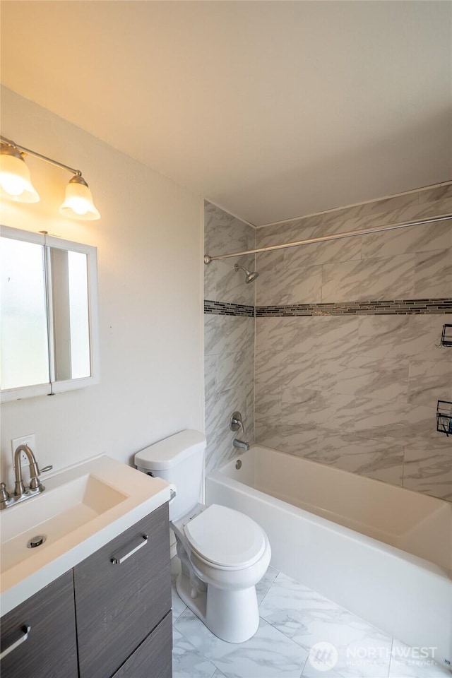 1117 W Stockwell St, Aberdeen, WA 98520 - full bath featuring vanity, marble look tile flooring, and bathtub / shower combination