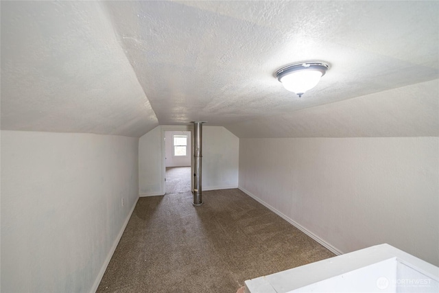 1117 W Stockwell St, Aberdeen, WA 98520 - additional living space featuring a textured ceiling, lofted ceiling, and carpet flooring
