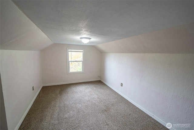 1117 W Stockwell St, Aberdeen, WA 98520 - bonus room featuring vaulted ceiling, carpet flooring, and a textured ceiling