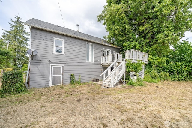 1117 W Stockwell St, Aberdeen, WA 98520 - back of property featuring a deck and stairs