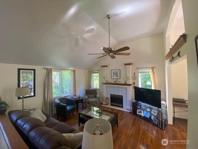5846 SW 44th St, Port Orchard, WA 98367 - living room with wood finished floors, lofted ceiling, ceiling fan, and a fireplace with flush hearth