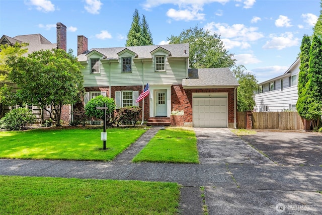 2809 Nichols Blvd, Longview, WA 98632 - view of front of home with a garage, brick siding, and concrete driveway