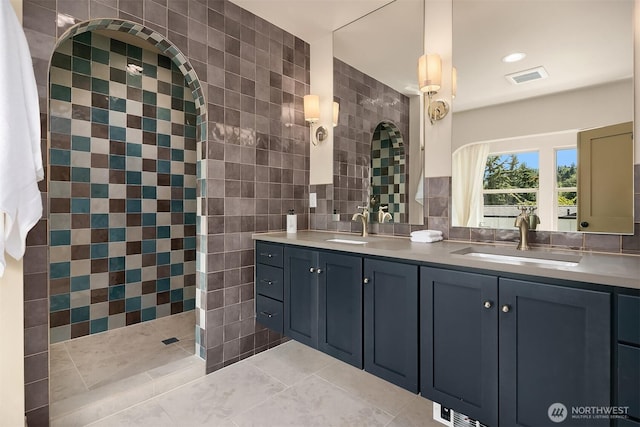 5037 25th Ave SW, Seattle, WA 98106 - full bathroom featuring double vanity, tile patterned floors, tile walls, and a walk in shower