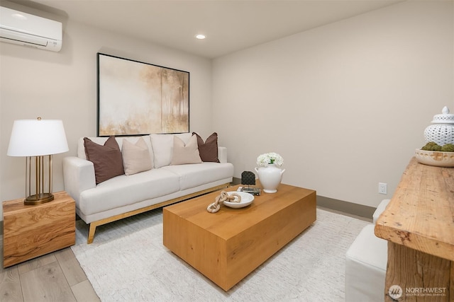 5037 25th Ave SW, Seattle, WA 98106 - living room featuring an AC wall unit, light wood finished floors, and recessed lighting