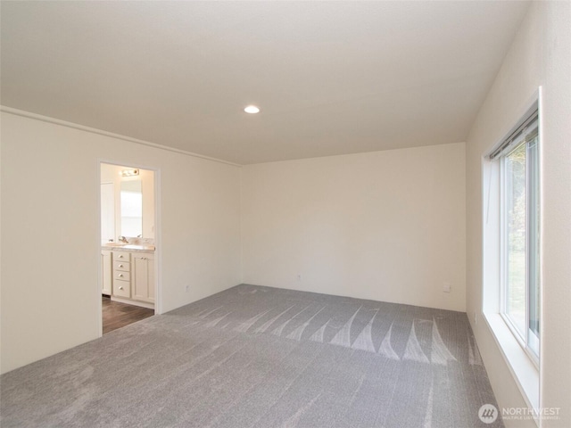 303 Critter Country Trl, Sequim, WA 98382 - unfurnished room featuring dark carpet, healthy amount of natural light, and recessed lighting