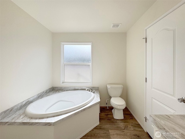 303 Critter Country Trl, Sequim, WA 98382 - full bathroom with wood finished floors and a garden tub