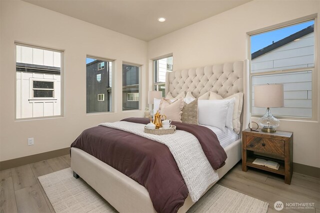 5033 25th Ave SW Unit C, Seattle, WA 98106 - bedroom with wood finished floors and recessed lighting