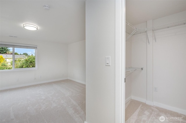 16812 125th Ave SE, Renton, WA 98058 - walk in closet featuring carpet floors