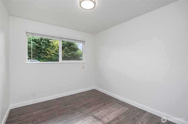 16812 125th Ave SE, Renton, WA 98058 - unfurnished room with baseboards and dark wood finished floors