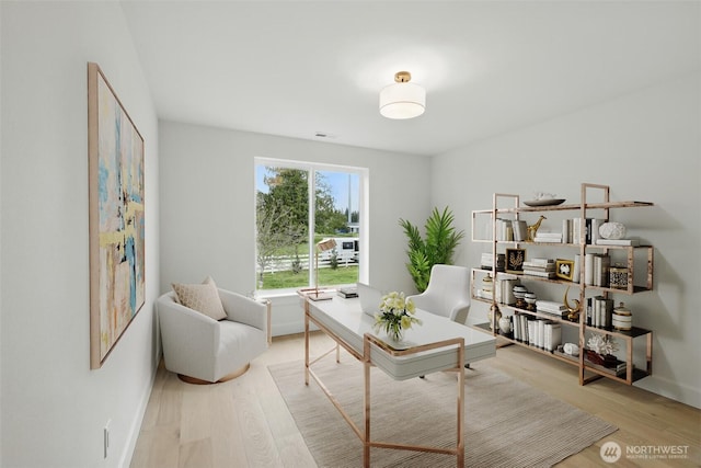 150 Cliff Robinson Ln, Sequim, WA 98382 - office area featuring light wood-style flooring and baseboards