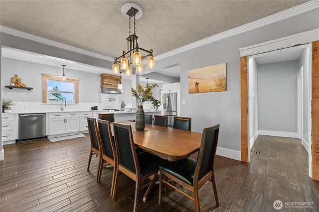 256 & St, Buckley, WA 98321 - dining area featuring dark wood finished floors and crown molding