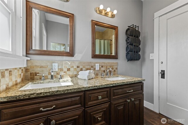 256 & St, Buckley, WA 98321 - full bath featuring double vanity, decorative backsplash, and wood finished floors