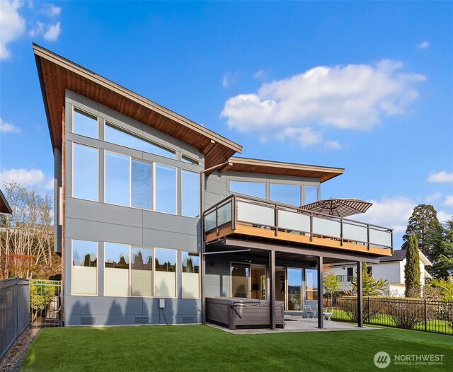 3003 Mountain View Ave N, Renton, WA 98056 - back of house featuring a hot tub, crawl space, a fenced backyard, and a patio area