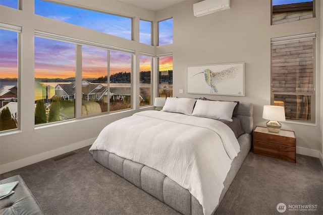3003 Mountain View Ave N, Renton, WA 98056 - carpeted bedroom with a wall mounted AC and a towering ceiling