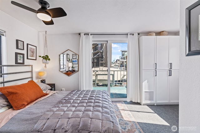 2401 N Northlake Way Unit F6, Seattle, WA 98103 - bedroom featuring access to outside, carpet flooring, and a ceiling fan
