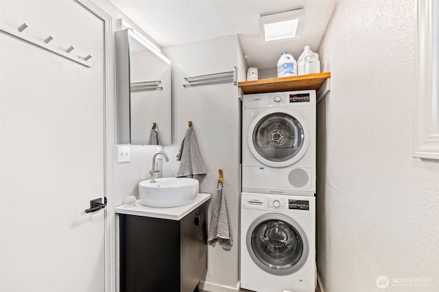 2401 N Northlake Way Unit F6, Seattle, WA 98103 - laundry room featuring stacked washer / dryer