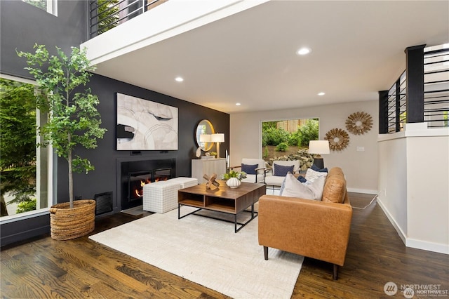 18510 NE 15th Pl, Bellevue, WA 98008 - living area with a fireplace, wood finished floors, and recessed lighting