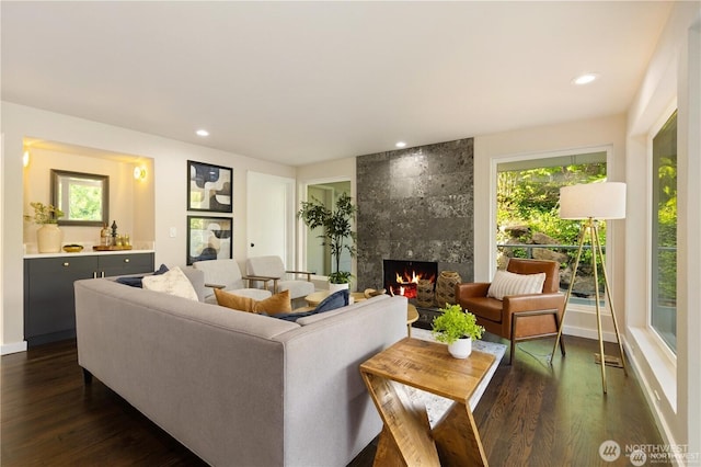 18510 NE 15th Pl, Bellevue, WA 98008 - living area with dark wood-type flooring, a fireplace, and recessed lighting