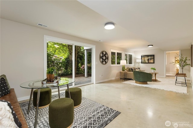18510 NE 15th Pl, Bellevue, WA 98008 - dining area featuring finished concrete flooring and baseboards