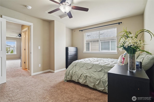13712 Big Sky Dr E, Bonney Lake, WA 98391 - carpeted bedroom featuring a ceiling fan and baseboards