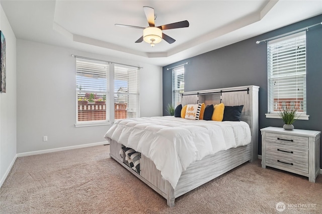 13712 Big Sky Dr E, Bonney Lake, WA 98391 - bedroom featuring a raised ceiling, carpet, and a ceiling fan