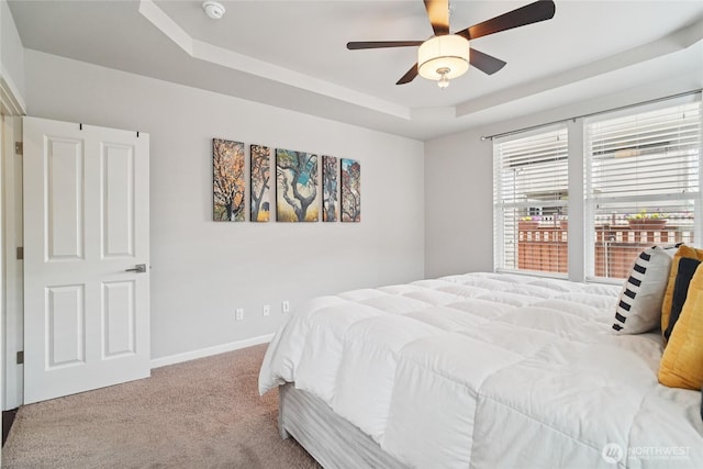 13712 Big Sky Dr E, Bonney Lake, WA 98391 - bedroom with a tray ceiling, carpet floors, and ceiling fan
