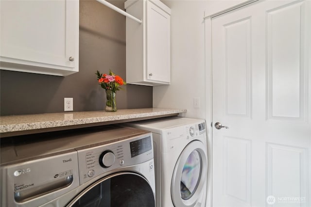 13712 Big Sky Dr E, Bonney Lake, WA 98391 - washroom with washing machine and clothes dryer and cabinet space