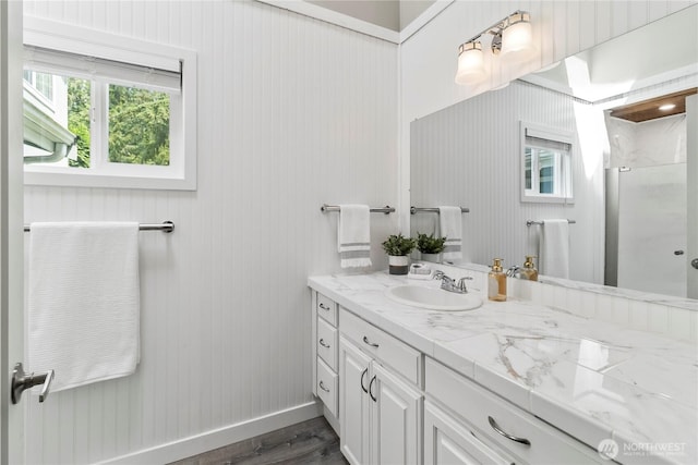 1535 Ten Mile Rd, Everson, WA 98247 - bathroom with vanity, a stall shower, healthy amount of natural light, and wood finished floors