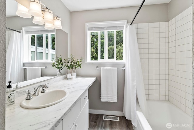 1535 Ten Mile Rd, Everson, WA 98247 - bathroom featuring vanity, wood finished floors, and shower / tub combo with curtain