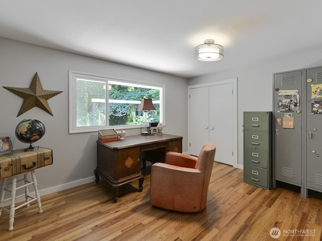 7819 25th Ave E, Tacoma, WA 98404 - office area featuring light wood finished floors and baseboards