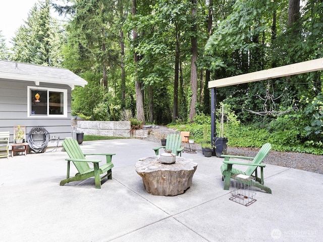 7819 25th Ave E, Tacoma, WA 98404 - view of patio featuring an outdoor fire pit