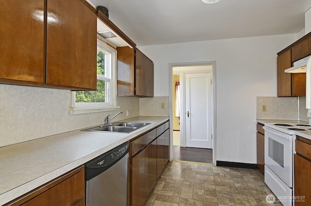 5312 S Hazel St, Seattle, WA 98178 - kitchen with dishwasher, white range with electric stovetop, light countertops, decorative backsplash, and under cabinet range hood