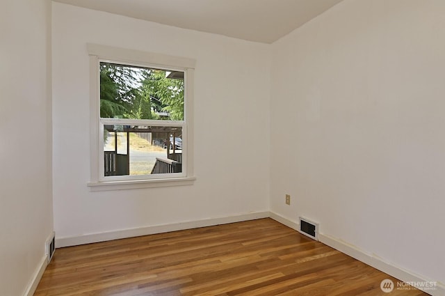 5312 S Hazel St, Seattle, WA 98178 - spare room featuring wood finished floors