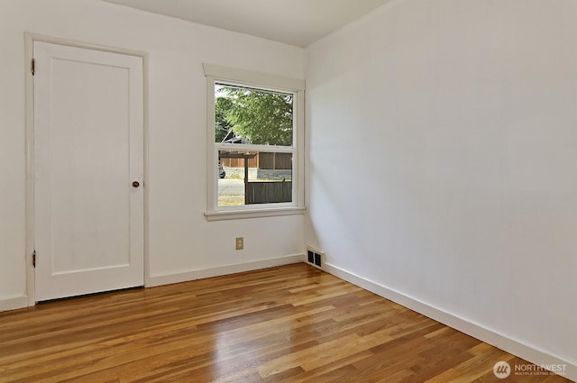 5312 S Hazel St, Seattle, WA 98178 - spare room featuring wood finished floors and baseboards