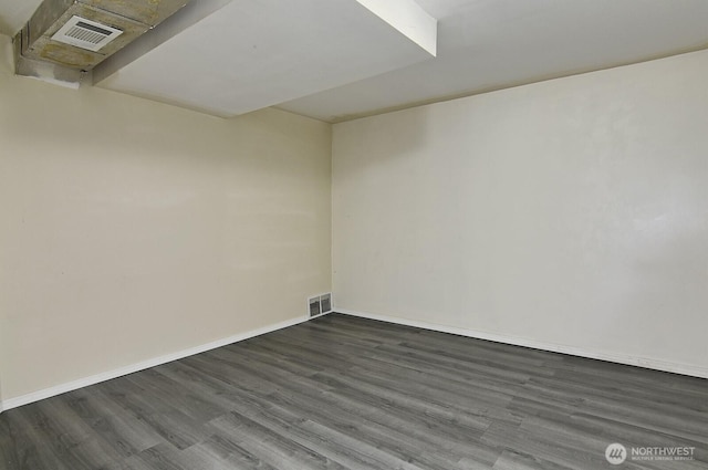 5312 S Hazel St, Seattle, WA 98178 - spare room featuring dark wood-style flooring and baseboards