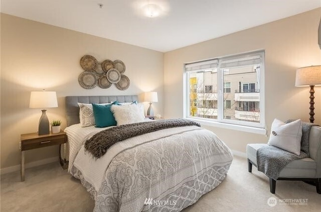 2440 Western Ave Unit 503, Seattle, WA 98121 - bedroom featuring carpet floors and baseboards