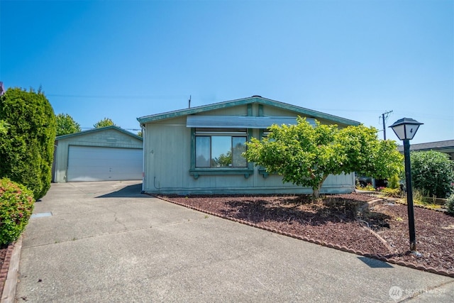 37301 28th Ave S Unit 4, Federal Way, WA 98003 - view of front of property featuring an outbuilding and a garage