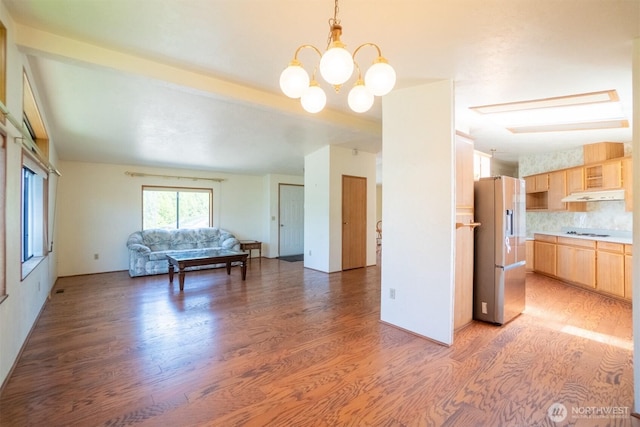37301 28th Ave S Unit 4, Federal Way, WA 98003 - living room featuring light wood-type flooring and a chandelier