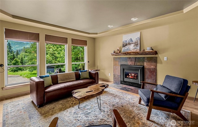 359 Timber Ridge Canyon Rd, Leavenworth, WA 98826 - living room with wood finished floors, a tile fireplace, and a raised ceiling