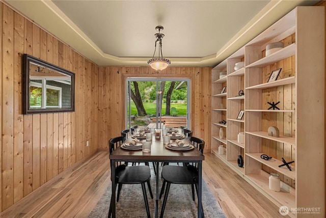 359 Timber Ridge Canyon Rd, Leavenworth, WA 98826 - dining space with light wood-type flooring, wooden walls, and a raised ceiling