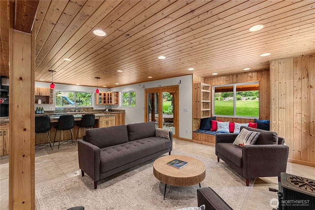 359 Timber Ridge Canyon Rd, Leavenworth, WA 98826 - living area featuring recessed lighting, wood ceiling, light tile patterned flooring, and wooden walls