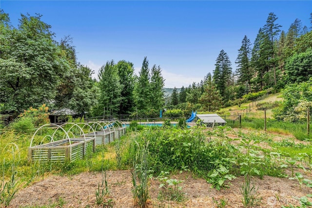 359 Timber Ridge Canyon Rd, Leavenworth, WA 98826 - view of yard with a garden and a wooded view
