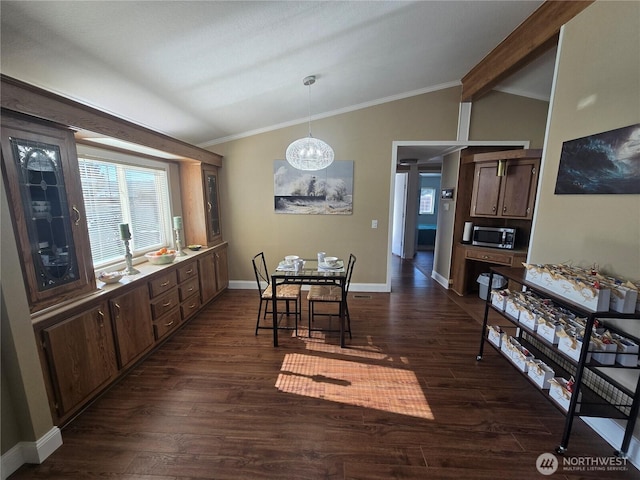 836 E Harman Way E Unit 62, Orting, WA 98360 - dining space featuring a chandelier, crown molding, and dark wood-type flooring